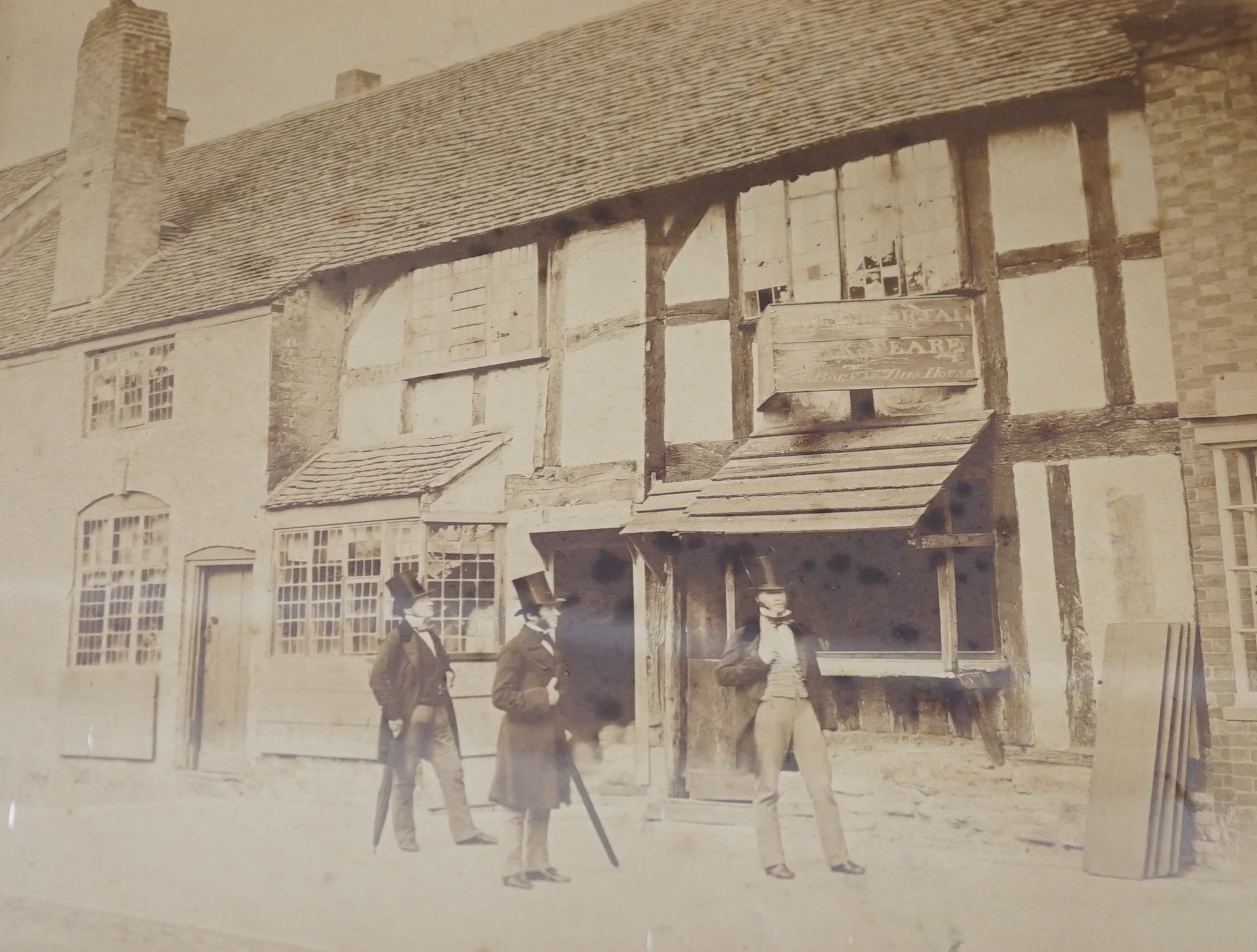 A framed 19th century photograph of Shakespeare’s home, together with its provenance letter. Frame overall 39 x 44cm